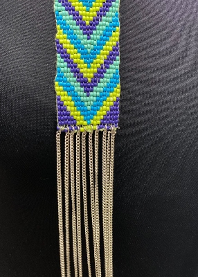 Sautoir tissé et drappé defile